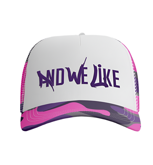 A white and pink trucker hat with purple and black abstract patterns on the brim. The front features bold, stylized purple capital letters that read "AND WE LIKE." The hat has a mesh back and a solid front panel.