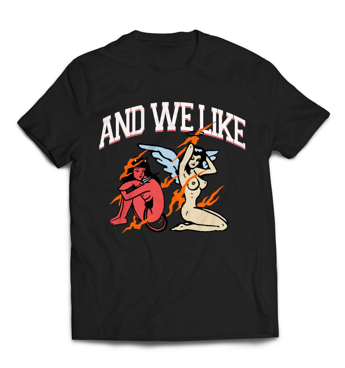 A black T-shirt with a graphic design. The design features a red devilish figure sitting with crossed legs and arms, and a nude, angelic figure with blue wings raising her arms. Above them, the text reads "AND WE LIKE" in bold, white letters.