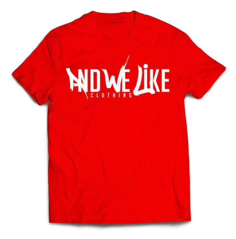 A Cherry Red T-shirt with the text "AND WE LIKE CLOTHING" printed in white on the front. The letters "AND WE LIKE" are creatively designed while "CLOTHING" is in a straightforward font below.