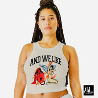 Front facing graphic tan colored crop-top features a devil on one side and an angel on the other, symbolizing the eternal struggle between temptation and virtue. 