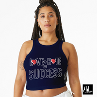 Front facing is a trendy navy blue crop top with a captivating "Love + Hate" graphic, blending contrasting fonts to express both sweet and edgy vibes in one stylish garment.